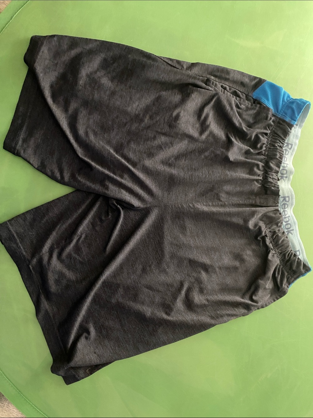 Reebok Men's Black Shorts with Blue Waistband Accent